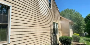 Long Island home siding prepared with soft washing before exterior painting